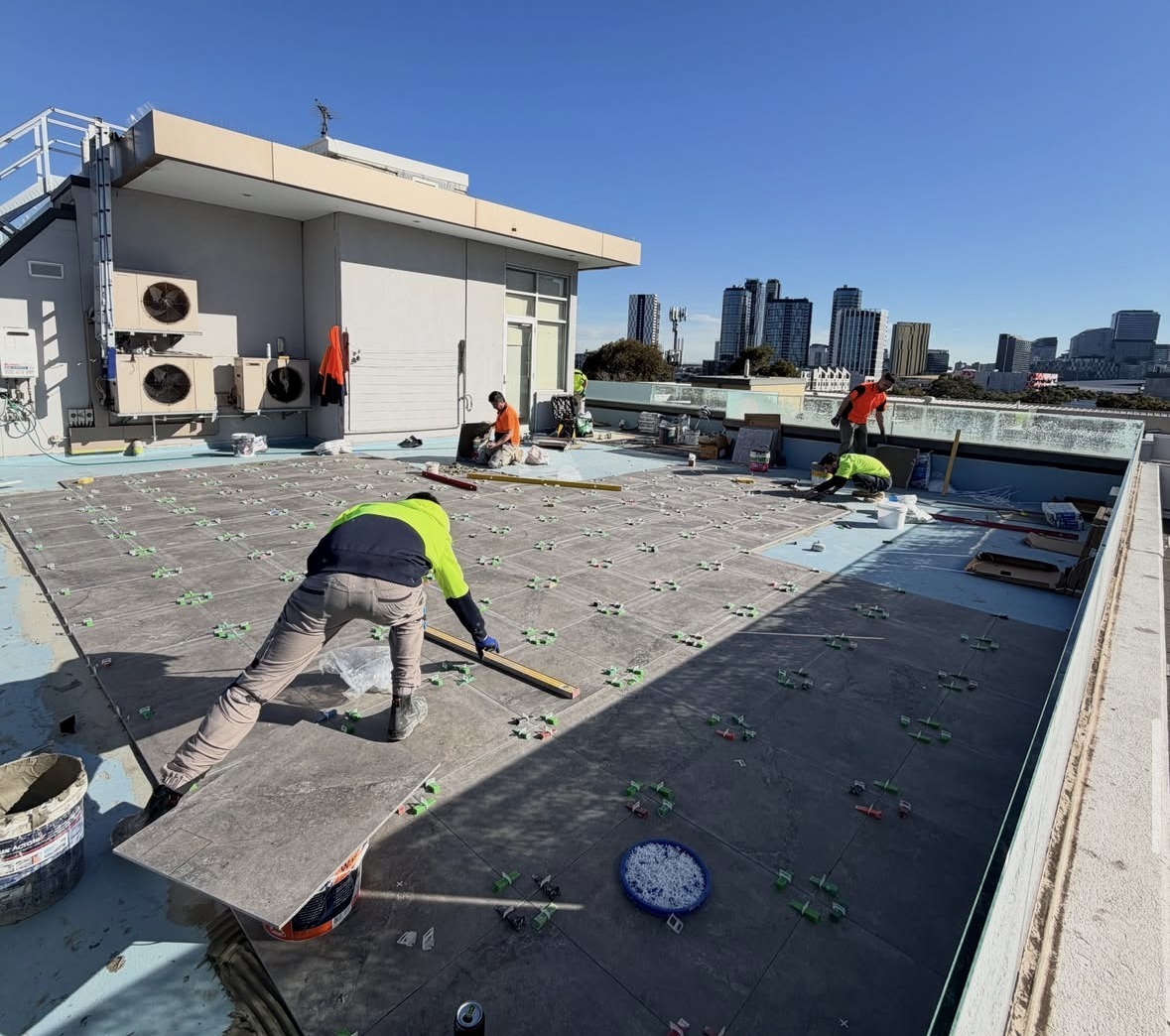 External podium screeding and surface preparation in progress
